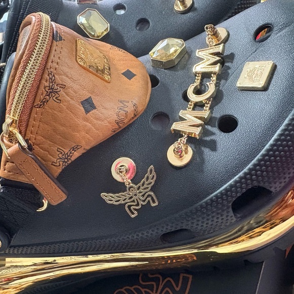 MCM Shoes - MCM Black and Tan Clogs with Gold Details